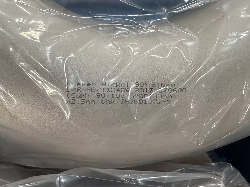 Inspection detail of 90 degree copper nickel elbow showing surface finish