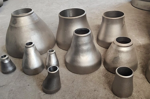 Copper nickel concentric reducers for marine piping systems